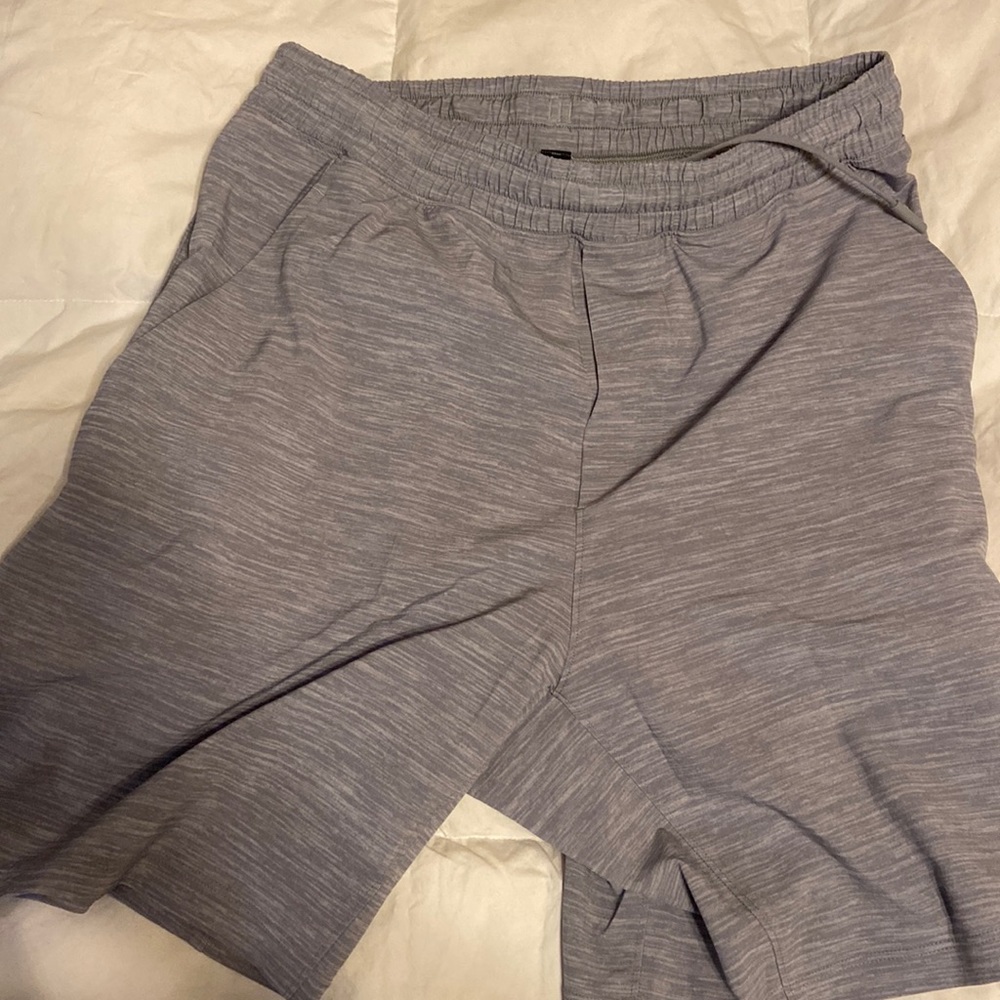 Grey lululemon men’s shorts. Never worn, took tags off so can’t return !!!